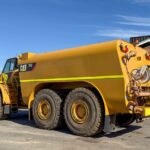 2006 CATERPILLAR 740 WATER CART