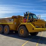 2006 CATERPILLAR 740 WATER CART