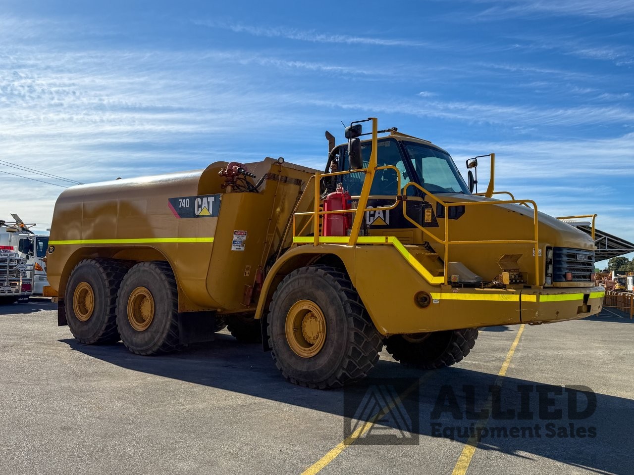 2006 CATERPILLAR 740 WATER CART