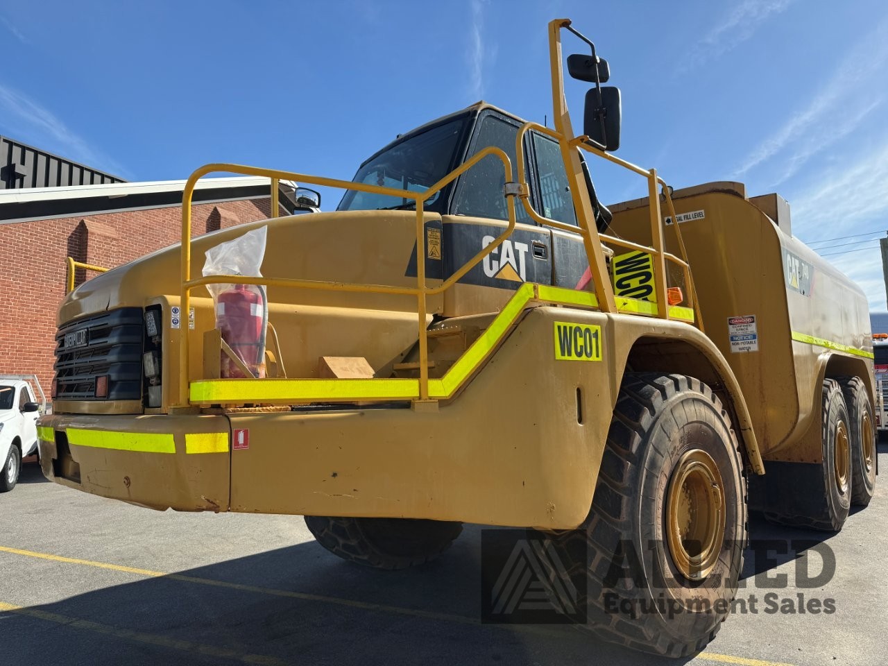 2006 CATERPILLAR 740 WATER CART