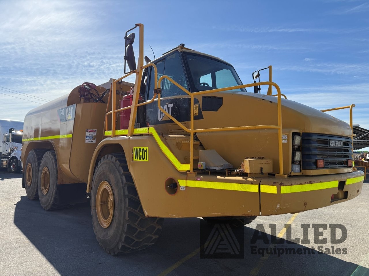 2006 CATERPILLAR 740 WATER CART