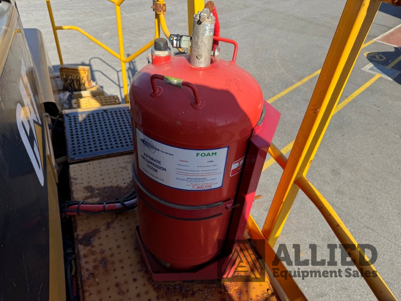 2006 CATERPILLAR 740 WATER CART