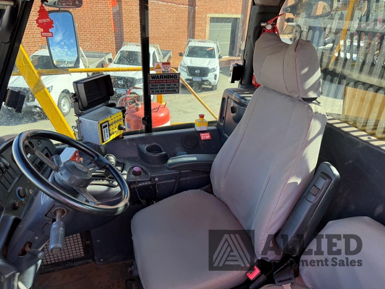 2006 CATERPILLAR 740 WATER CART